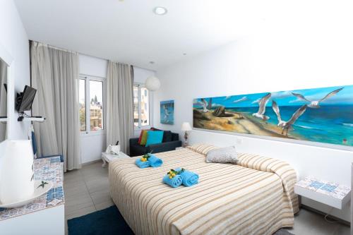 Postel nebo postele na pokoji v ubytování Hotel Opera