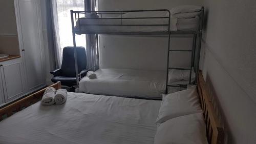 Postel nebo postele na pokoji v ubytování Brampton Guest House