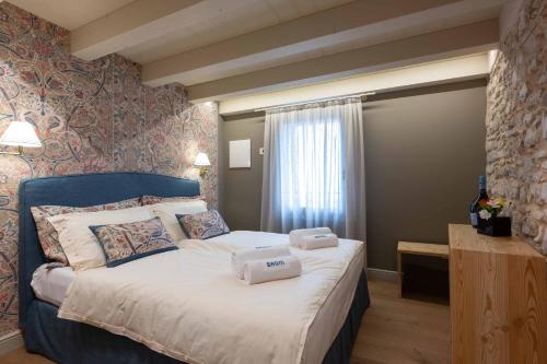 Posteľ alebo postele v izbe v ubytovaní B&B CASA OLTRAVAL