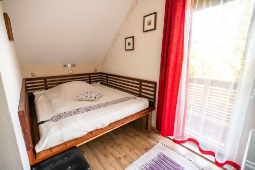 A bed or beds in a room at Holiday Home Razglednik