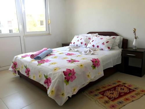 Ein Bett oder Betten in einem Zimmer der Unterkunft Apartments KRAJA