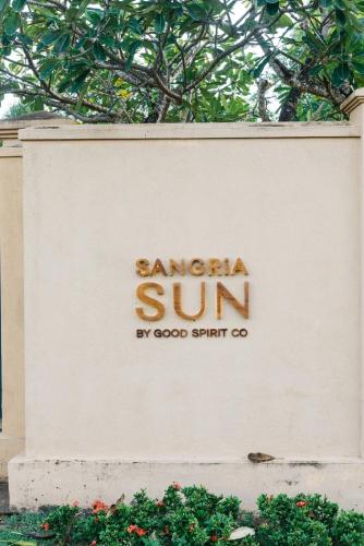 a sign on the side of a building at Sangria Sun in Wadduwa