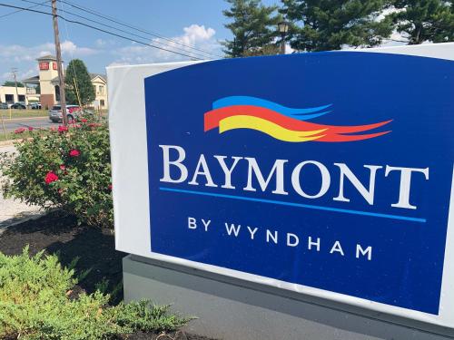 a blue sign for a baymont by windham at Baymont by Wyndham Chambersburg in Chambersburg