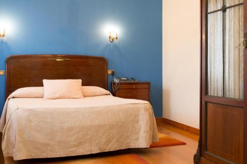 Postel nebo postele na pokoji v ubytování Casa España