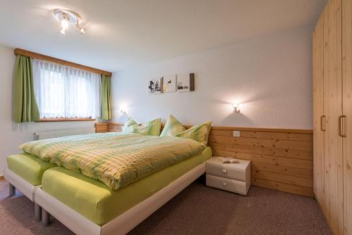 Un pat sau paturi într-o cameră la Abendstern