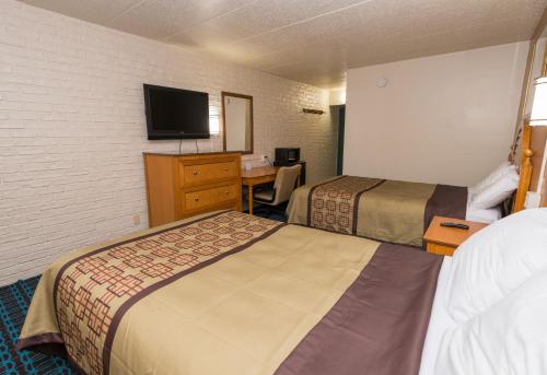 Katil atau katil-katil dalam bilik di Cambridge Inn