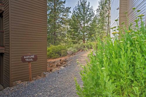 a sign that reads nature trail next to a building at Bend Condo with Deck, Resort-Style Amenities and Views in Bend