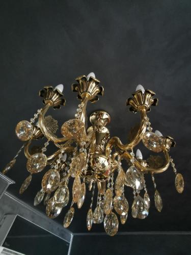 a gold chandelier with a bunch of diamonds at Chic Apartment 2 in Sharm El Sheikh
