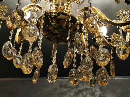 a gold chandelier with a bunch of diamonds at Chic Apartment 2 in Sharm El Sheikh