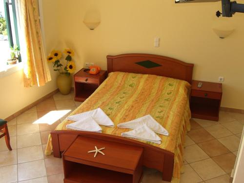 Voodi või voodid majutusasutuse Pyrgos Beach toas