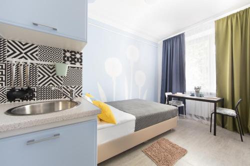 Кровать или кровати в номере Norke Varshavskaya