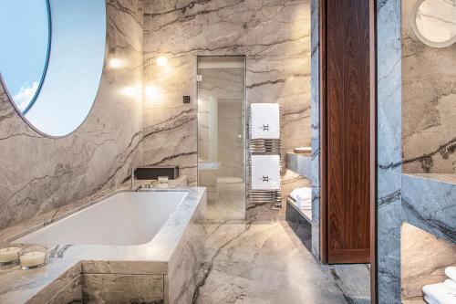 Koupelna v ubytování Jiva Hill Resort - Genève