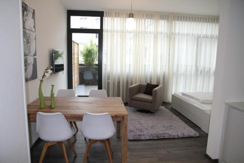 Ruang duduk di Boardinghouse Offenbach Service Apartments