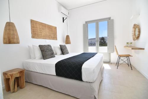 Una cama o camas en una habitación de Aegeeis