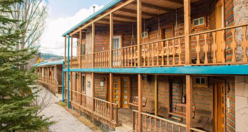 a building with wooden balconies on the side of it at The Lodge At Creel Eco - Hotel & Spa in Creel