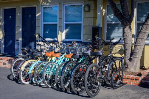 a row of bikes parked in front of a house at Coronado Inn in San Diego