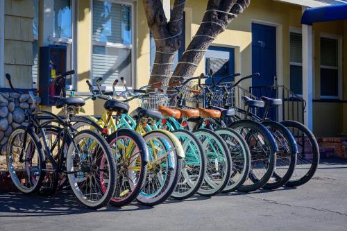 a row of bikes parked in front of a building at Coronado Inn in San Diego