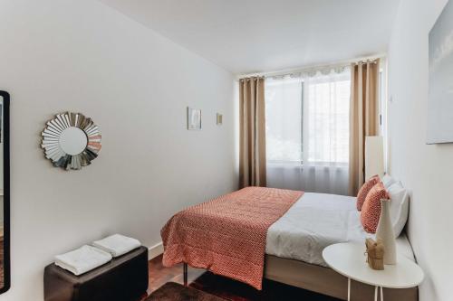 Ένα ή περισσότερα κρεβάτια σε δωμάτιο στο ESM Rental - Santa Catarina Cozy Apartment