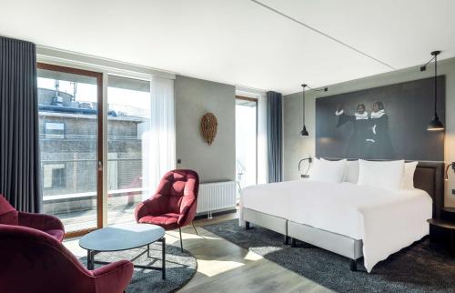 Postel nebo postele na pokoji v ubytování Radisson RED Aarhus