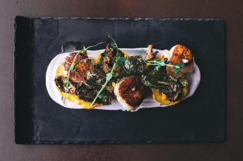 a plate of food with vegetables on a table at Enchantment in Sedona