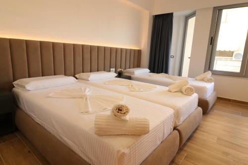 Postel nebo postele na pokoji v ubytování Hotel Tatzati 2