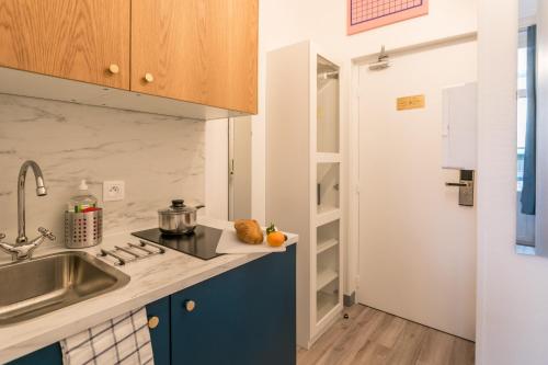 Una cocina o zona de cocina en WS Tour Eiffel - Saint-Charles