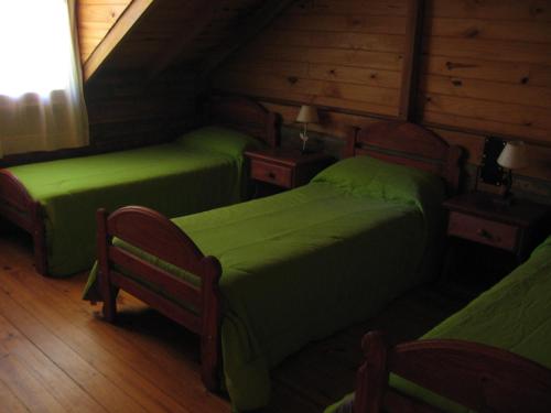 Cabañas Lorienにあるベッド