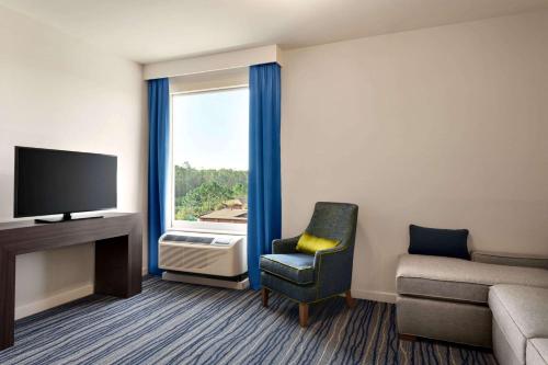 TV o dispositivi per l'intrattenimento presso La Quinta Inn & Suites by Wyndham Orlando I-Drive Theme Parks