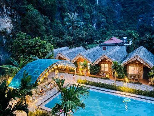 een afbeelding van een resort met een zwembad bij Tam Coc Valley Bungalow in Ninh Binh