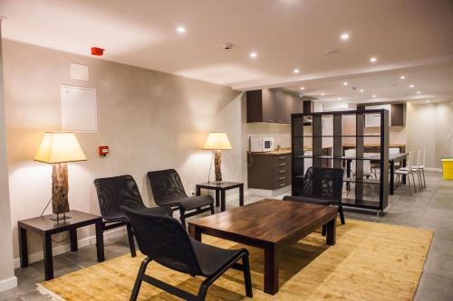 O bucătărie sau chicinetă la Rossio Suites