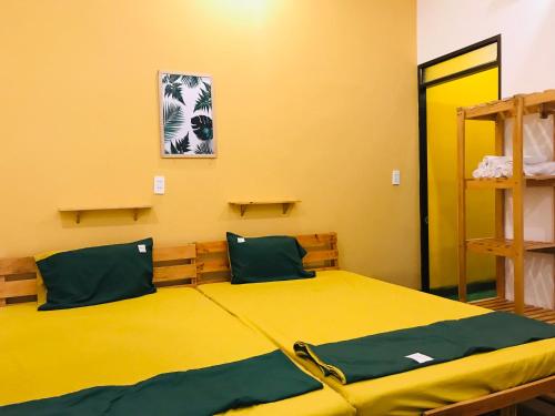 Ein Bett oder Betten in einem Zimmer der Unterkunft XAM HOUSE HOSTEL