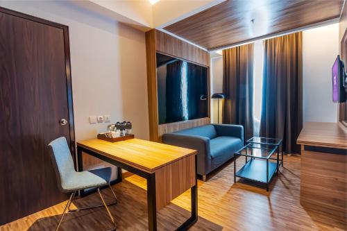 Χώρος καθιστικού στο Fox Hotel Jayapura