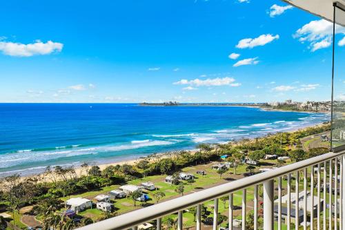 a view of the beach from the balcony of a resort at Elouera Tower in Maroochydore