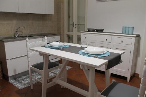 Kuchyň nebo kuchyňský kout v ubytování Il giardino di Artemide