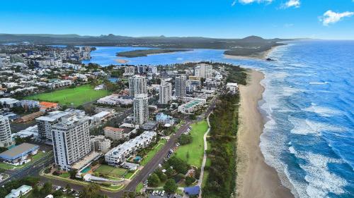 a large body of water with a city at Elouera Tower in Maroochydore