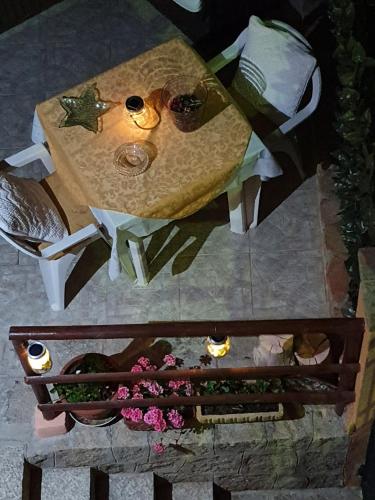 an overhead view of a table with glasses on it at 4 stagioni in Villasimius