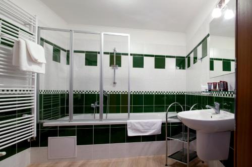 Koupelna v ubytování Wellness Hotel Ida