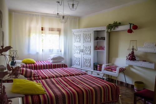 2 posti letto in una camera con 2 letti di Guesthouse Gate5 ad Anadia