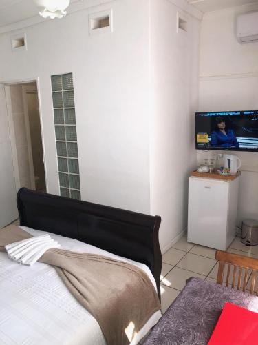Una cocina o zona de cocina en Muco Guest House