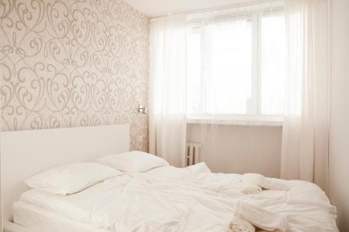 Katil atau katil-katil dalam bilik di Apartament Jawa
