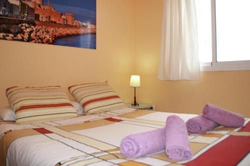 Postel nebo postele na pokoji v ubytování DescubreHome Playa de la Caleta