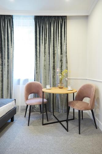 Ένα ή περισσότερα κρεβάτια σε δωμάτιο στο Apartamenty Klasztorna 25