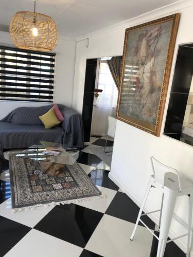 Zona de estar de Muco Guest House