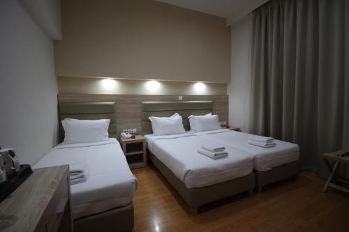 A bed or beds in a room at Elikon