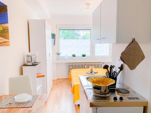 A cozinha ou cozinha compacta de Relax Aachener Boardinghouse Appartements Premium 1