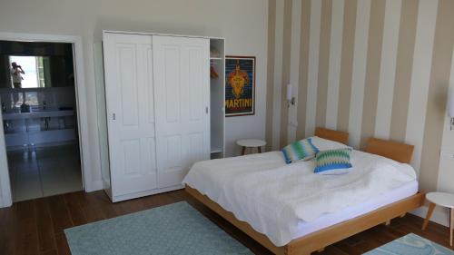 Ein Bett oder Betten in einem Zimmer der Unterkunft Villa Paradiso