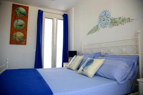 Posteľ alebo postele v izbe v ubytovaní Arcadia penthouse appartment Otranto