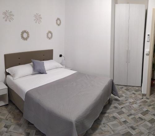 Ένα ή περισσότερα κρεβάτια σε δωμάτιο στο Bell'Albenga