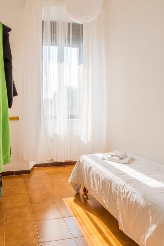 Una cama o camas en una habitación de House Sud Est