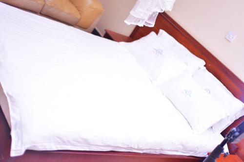 Nabisere Hotel Kalisizoにあるベッド
